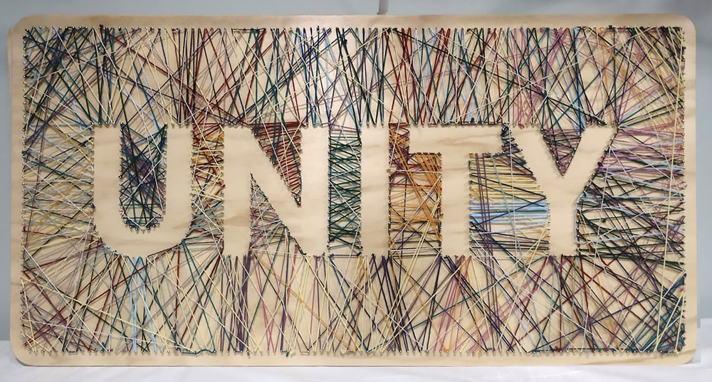 Message emerges from string art
