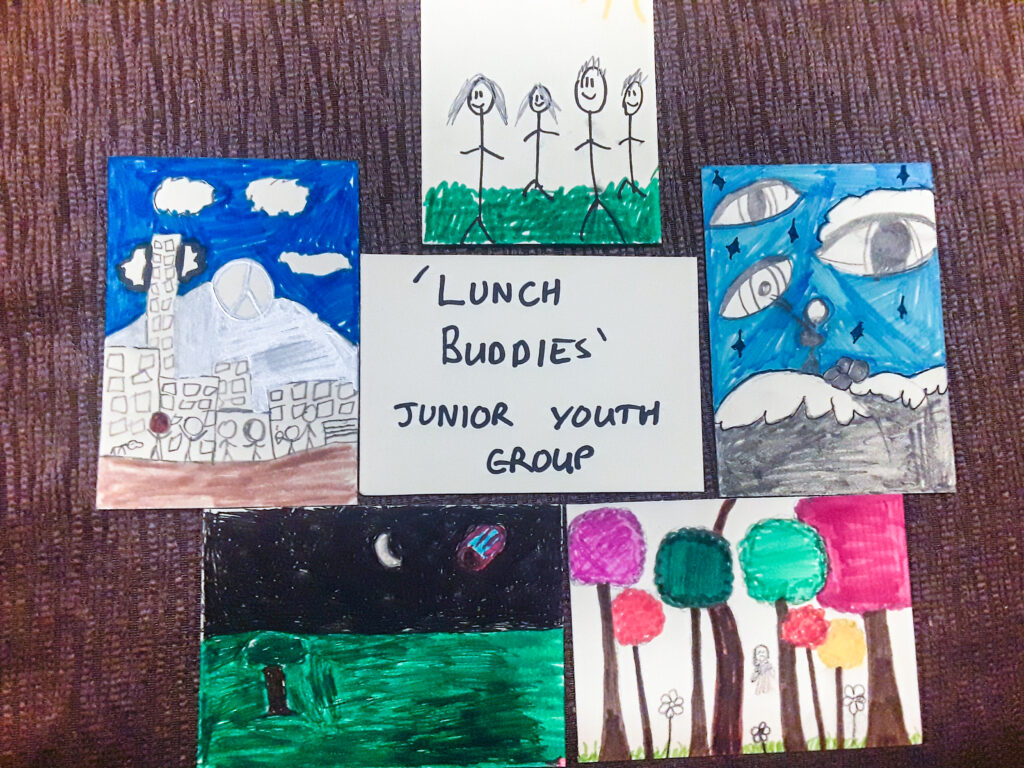A collection of 5 drawings around a card that says "Lunch Buddies Junior Youth Group"