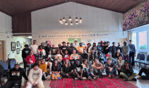 Large diverse group of smiling friends after a Junior Youth Camp.